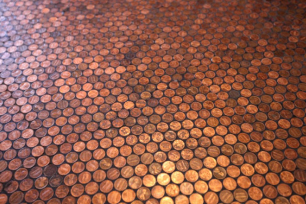 A plastic grid that lets you make your own penny floor tiles