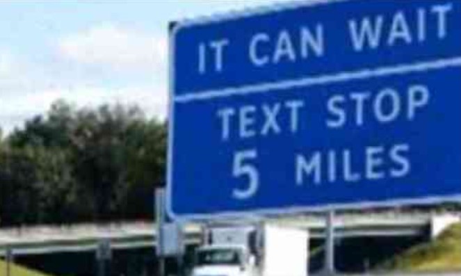 “Text stop” road signs