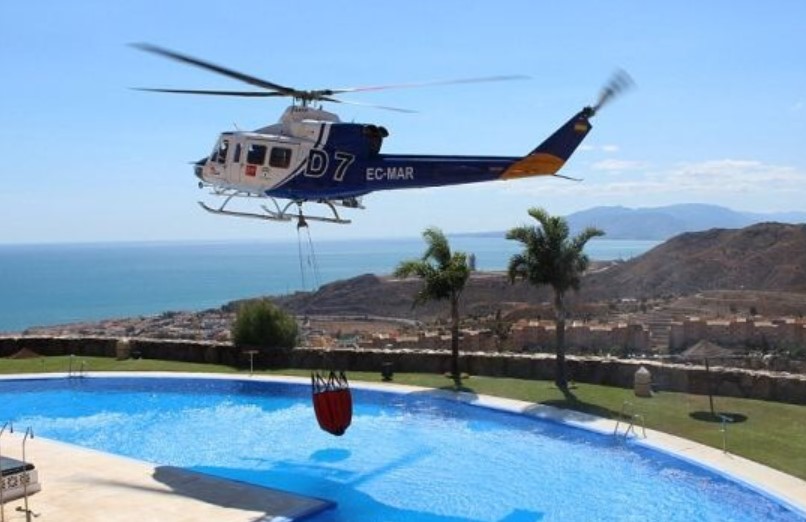 A recognised large symbol in the bottom of your outdoor swimming pool to allow water collection by helicopter firemen